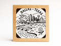 Onderkast Studio’s Dallas Texas Skyline Letterpress Coaster Set features black and white illustrations of iconic landmarks, including the skyline, bridges, Pegasus, Reunion Tower, and more. Packaged in a square cardboard box—perfect for Texas coffee tables.