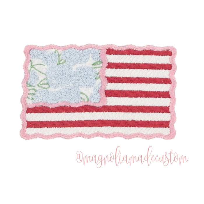 Decorative patch with American flag design on a white background, featuring the brand 'magnolia made custom'.