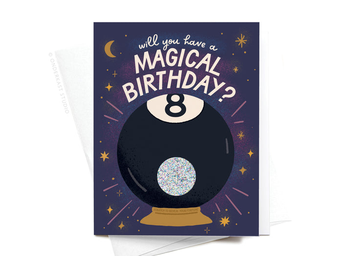 The Magic 8-Ball Birthday Scratch-Off Greeting Card by Onderkast Studio features a sparkling Magic 8-Ball with stars and “Will you have a MAGICAL BIRTHDAY?” on a dark purple background.