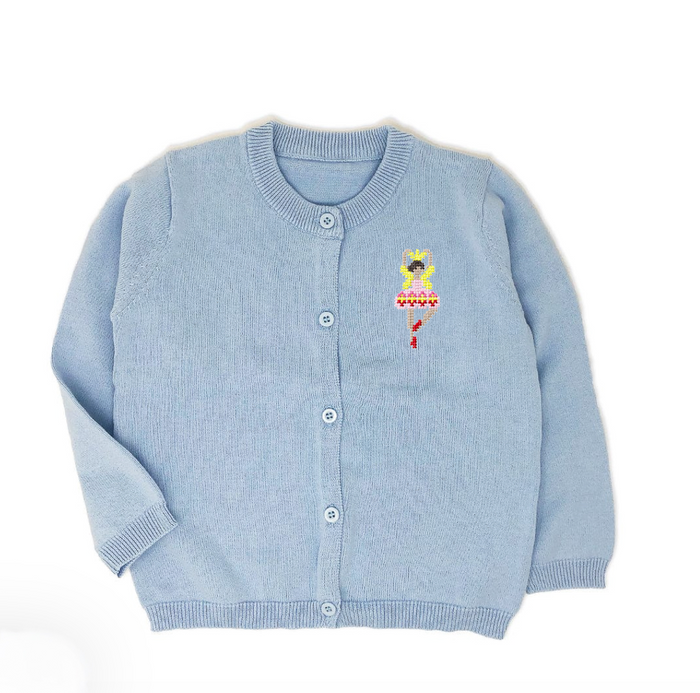 A light blue knit cardigan sweater with a small embroidered ballerina character on the left chest, featuring a button-front closure and ribbed collar, cuffs, and hem.