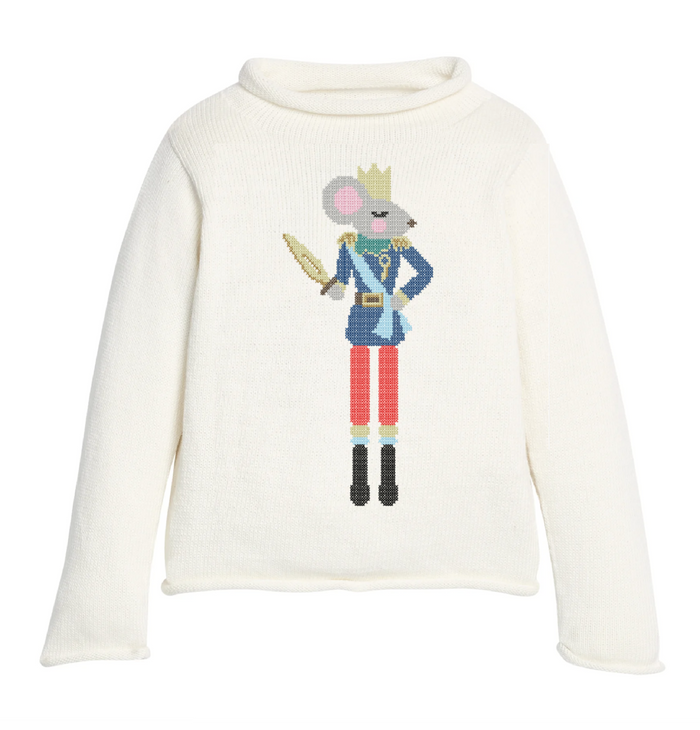 An off-white knit sweater with a mock neck and long sleeves, featuring a colorful embroidered graphic of a mouse dressed as a toy soldier on the front.